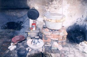 simple kitchen with brick cooking burner