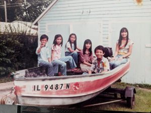 nguyen-kids-in-a-boat